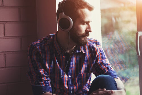 A man with headphones.