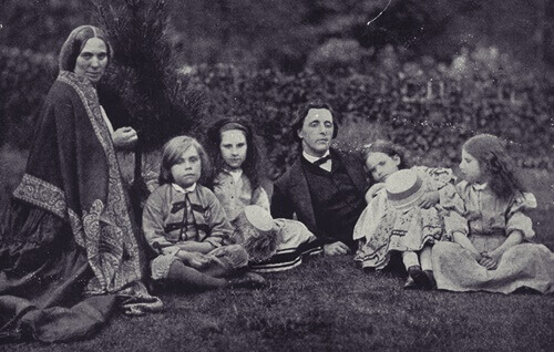 Lewis Caroll surrounded by the Lydell girls.
