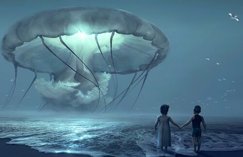 Two kids before a giant jellyfish.