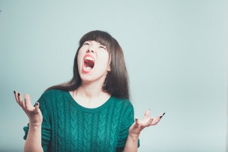 A woman screaming in frustration.