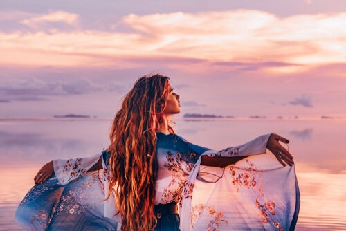 A woman by the sea.