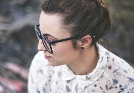 A woman with glasses.