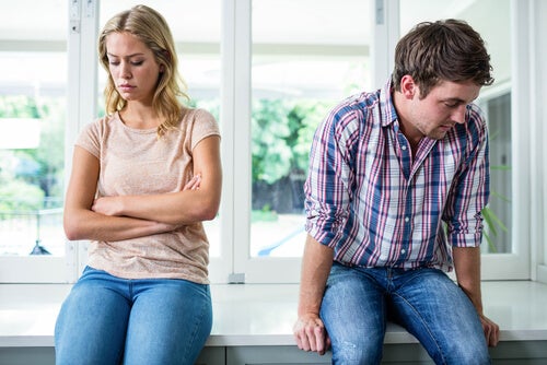 A man and a woman bored with each other.