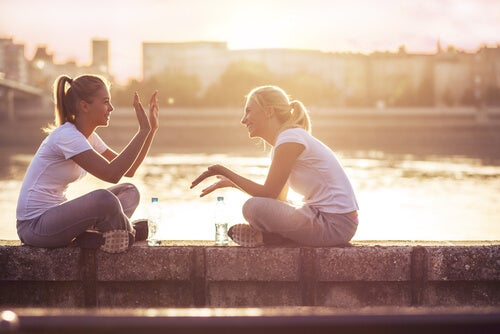 Two friends talking representing forms of courage.