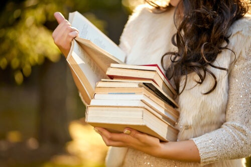 A woman with some books.