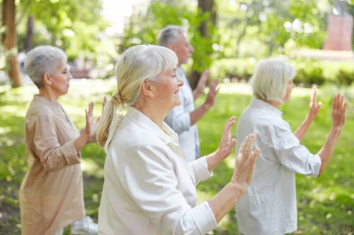A group of seniors practicing Qi Gong.