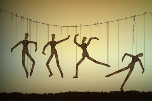 Dummies hanging from strings.