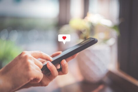 A person looking at their social media.