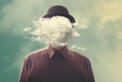A man with his head obscured by clouds.