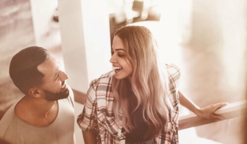 A man talking to a woman.