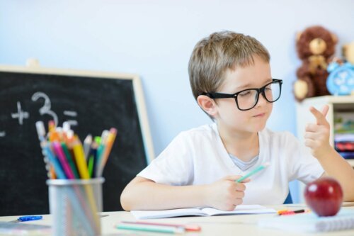 A child doing math with his fingers.