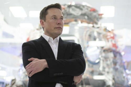 Elon Musk standing tall.