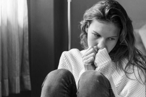 A woman wondering why people harm themselves.