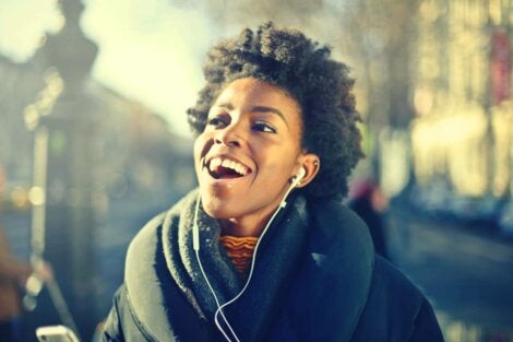 A woman with headphones.