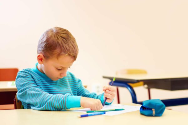 A boy drawing.