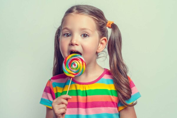 A girl with a lollipop.