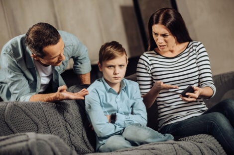 Two kids talking with their child.