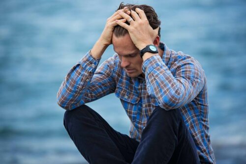 A worried man sitting.