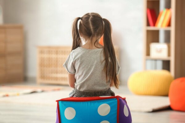 A girl in a room.