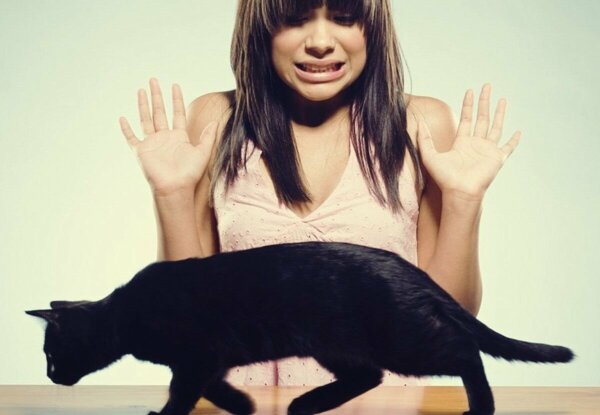 A woman with Ailurophobia.