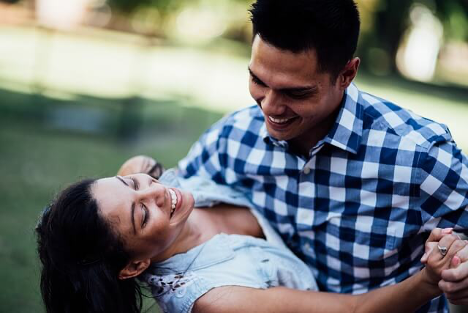 A happy couple dancing, showing the health benefits of dance.