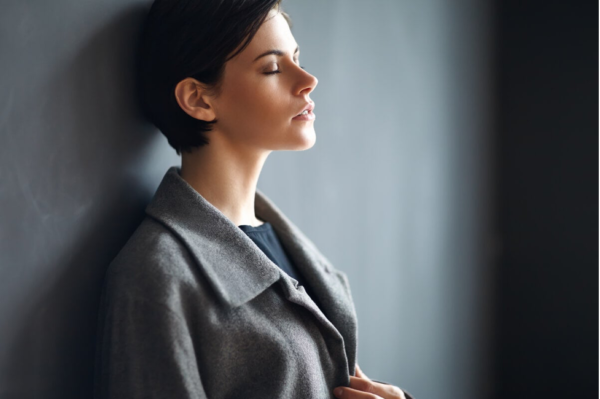 A woman looking stressed, perhaps not knowing how to cope with change.