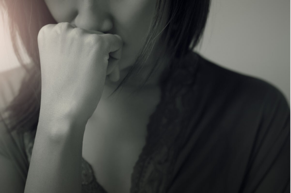 A woman looking uncertain.