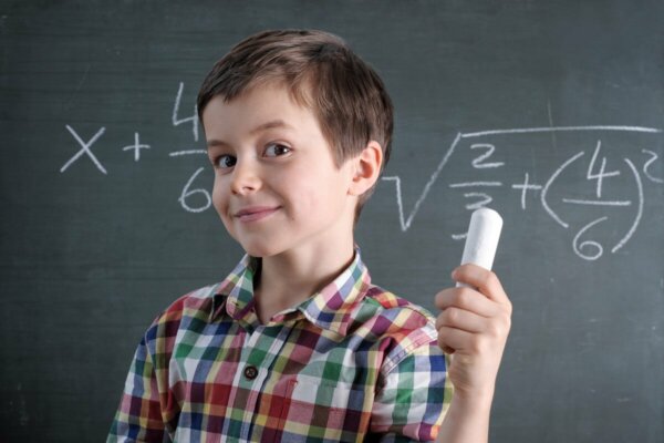 A boy doing Math.