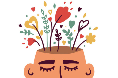 A man with flowers growing on his head.