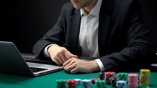 A man playing poker.