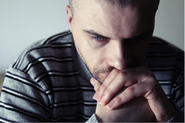 A man looking worried.