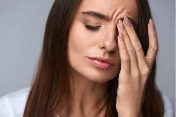 A woman trying to cope with stress in today's world.