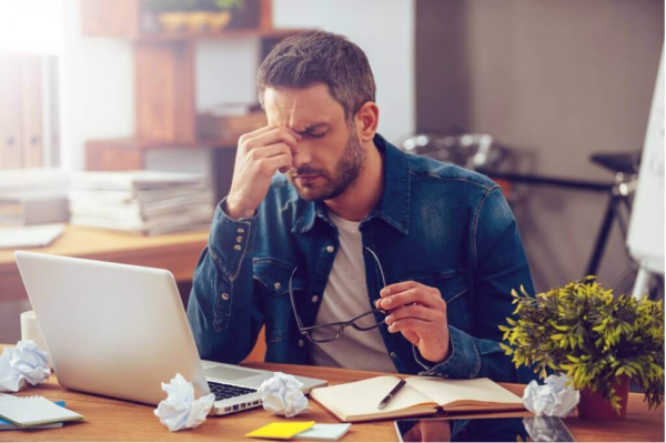A man trying to cope with stress in today's world.