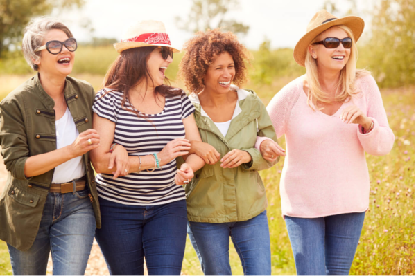Four people laughing.