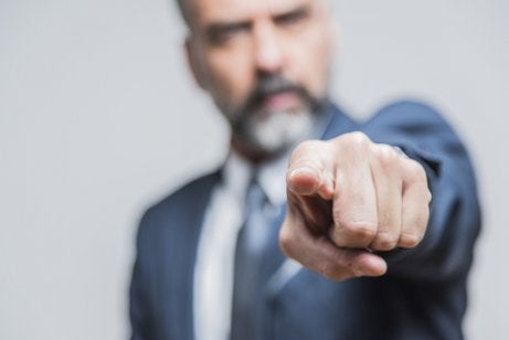 A guy pointing a finger in your face.