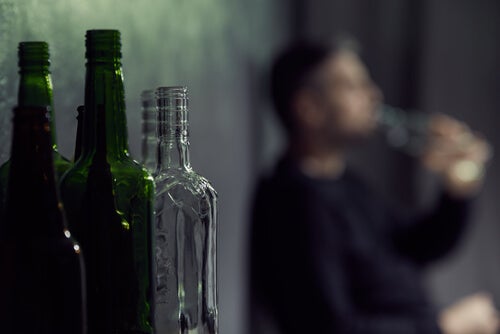 A man drinking.