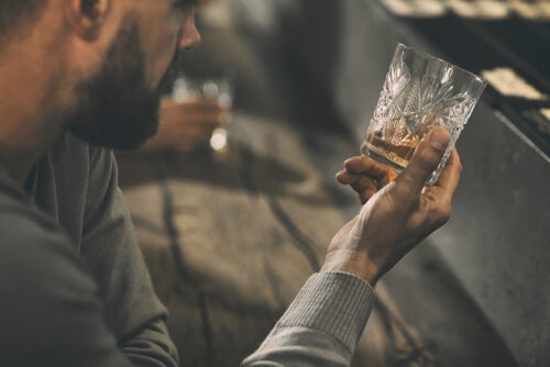 A man drinking.