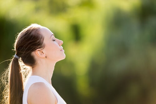 A woman breathing.
