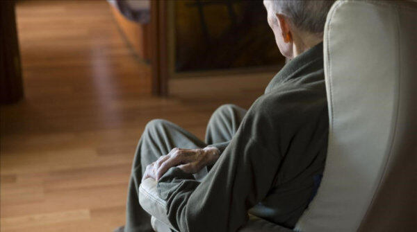 A man on a sofa.