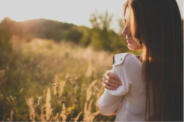 A woman looking pensive.