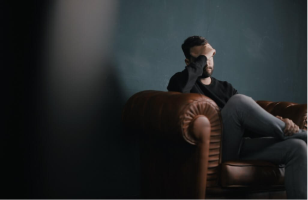 A man looking depressed.