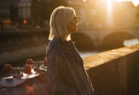 A woman on a bridge.