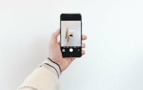 A mobile phone taking a picture.