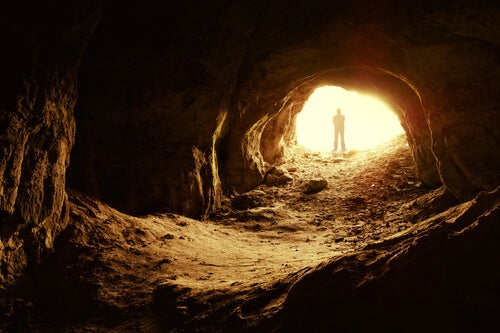 A man in a cave.
