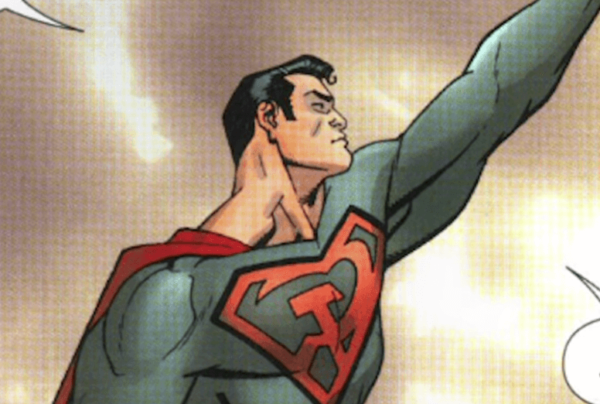 Superman with his arm raised.