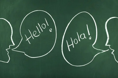 Two speech bubbles with Spanish and English.