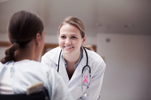 A doctor talking to a patient.