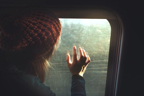 A person looking out the window.