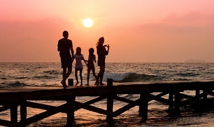 A resilient family on a pier.