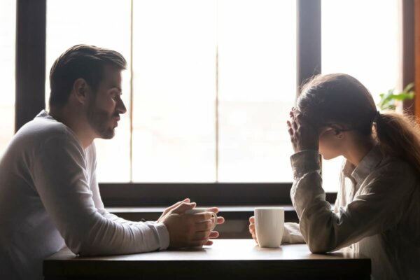 Two people having coffee.